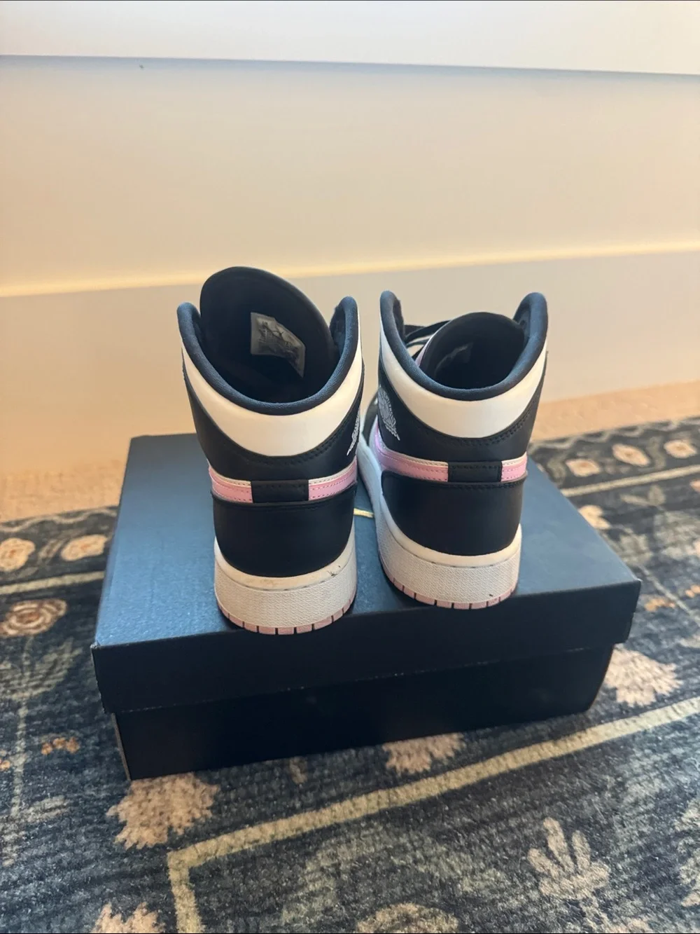 Nike Air Jordan 1 Mid High-Top Sneakers in Black, White & Pink